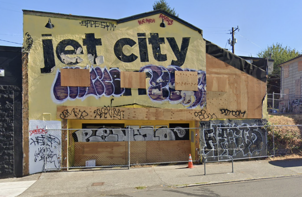 Jet City Improv theater, now condemned and covered with graffiti